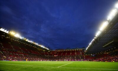 Old Trafford under floodlights
