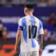 Lionel Messi, pictured from behind with the No 10 on the back of his Argentina shirt on show