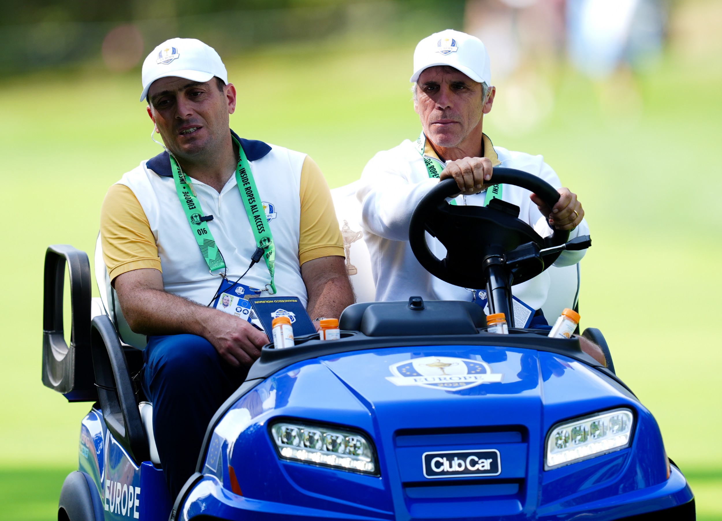 Francesco Molinari (left) and Gianfranco Zola (right) pictured sharing a golf buggy