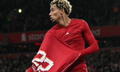 Hugo Ekitike pictured celebrating a goal by removing his Liverpool shirt