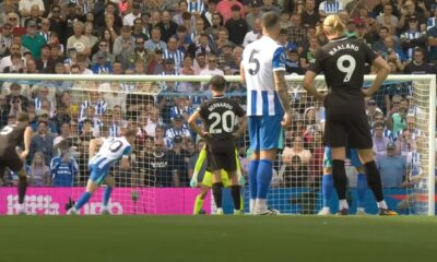James Milner pictured stepping up for a penalty kick for Brighton against Manchester City in August 2025 as Erling Haaland watches on