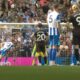 James Milner pictured stepping up for a penalty kick for Brighton against Manchester City in August 2025 as Erling Haaland watches on