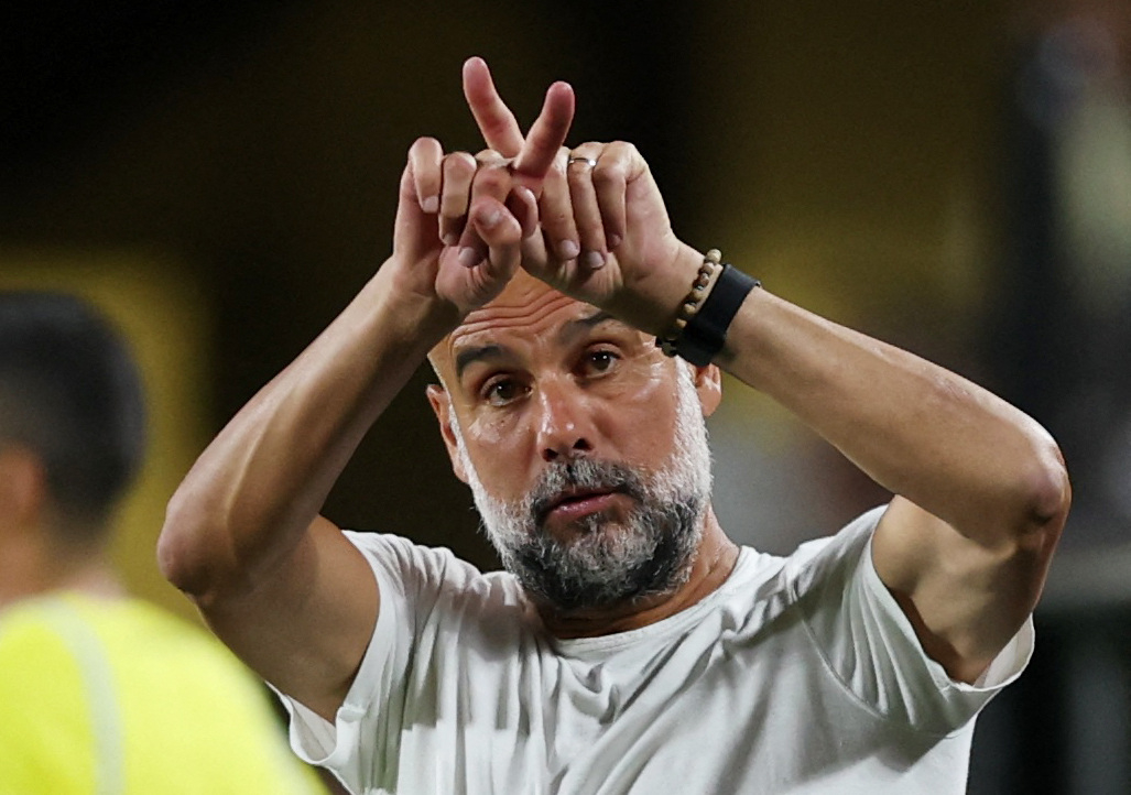 Man City manager Pep Guardiola pictured gesturing