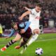 Jarrod Bowen (left) and Micky van de Ven (right) pictured battling for the ball during West Ham's 1-1 draw with Spurs in April 2024