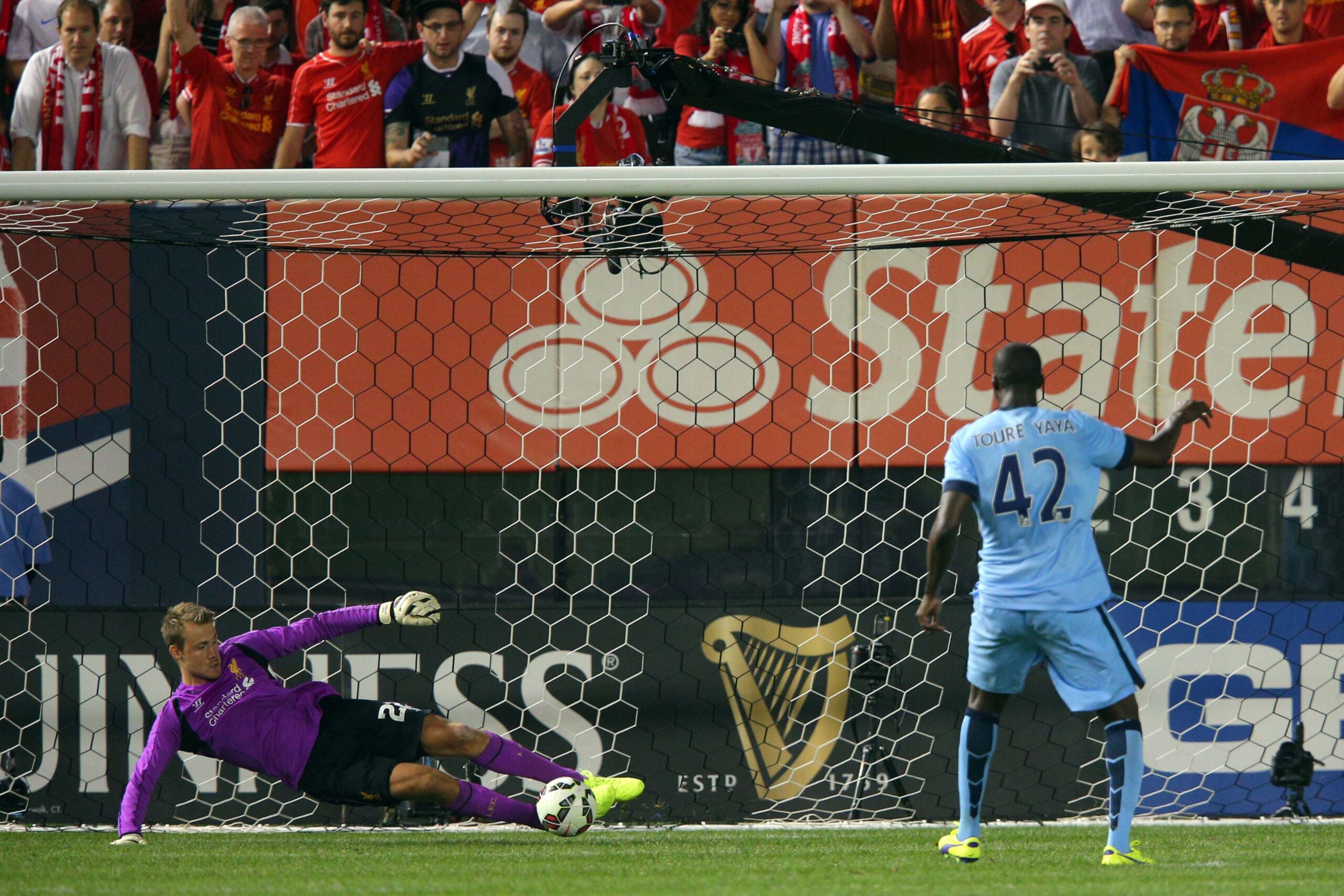 Yaya Toure pictured scoring a penalty against Liverpool in a pre-season game in 2014