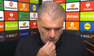Ange Postecoglou pictured holding his lip during a TNT Sports interview after Nottingham Forest lost 3-2 to FC Midtjylland