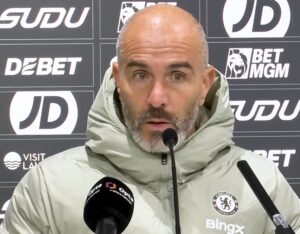 Enzo Maresca pictured in a press conference after Chelsea beat Wolves 4-3