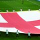 Giant England flag on the pitch at 2022 World Cup