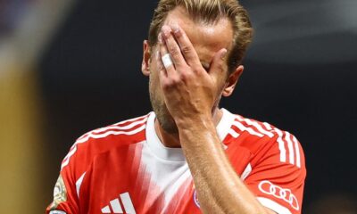 Bayern Munich striker Harry Kane pictured covering his face with his hand