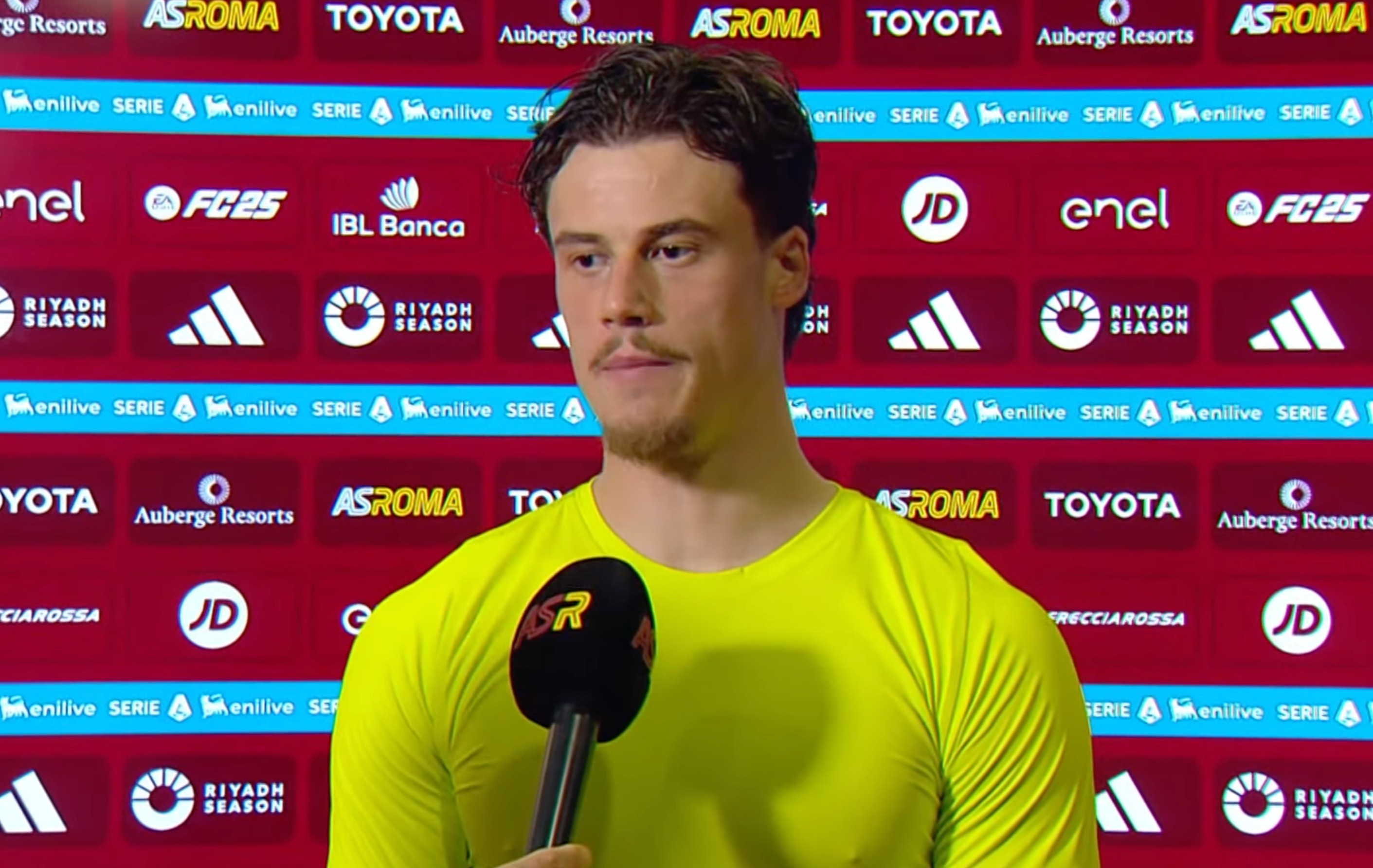 Roma goalkeeper Mile Svilar pictured during a post-game interview