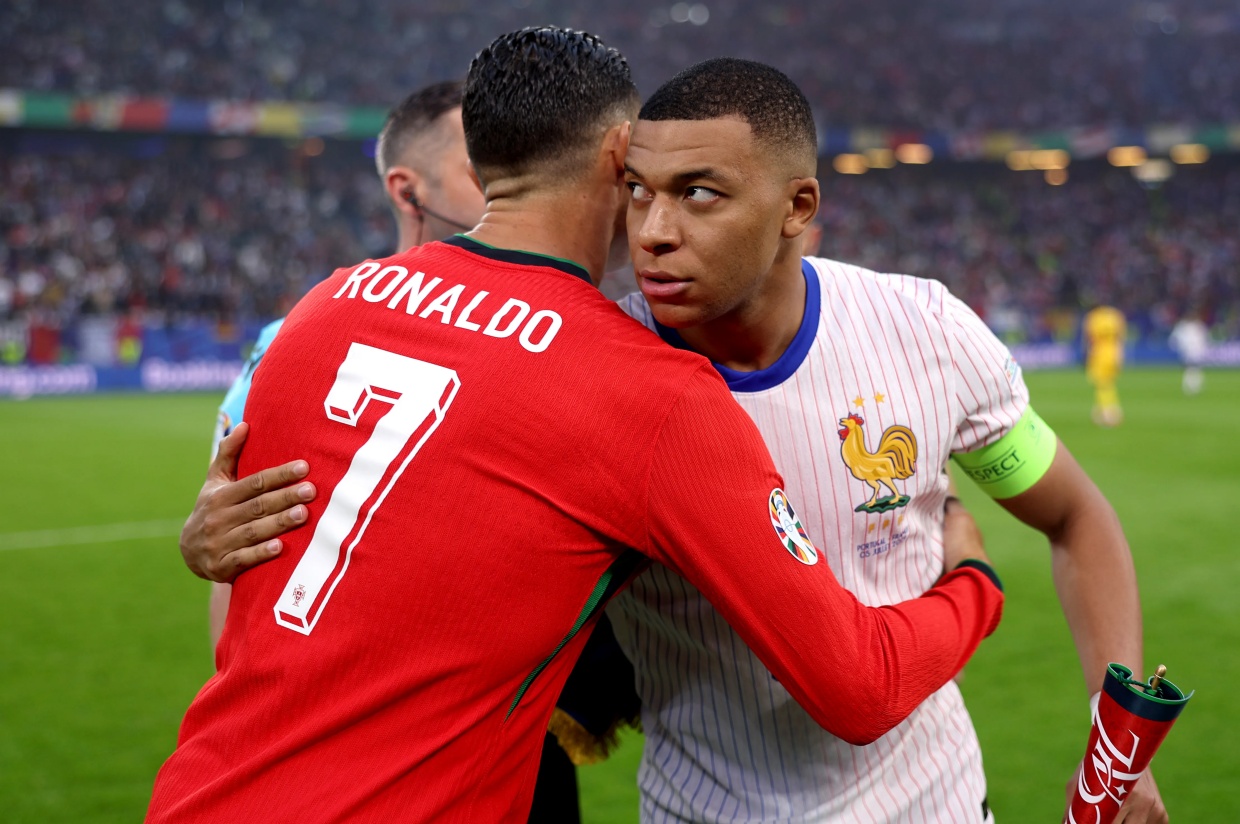 Mbappe and Ronaldo Hugging During an International Match
