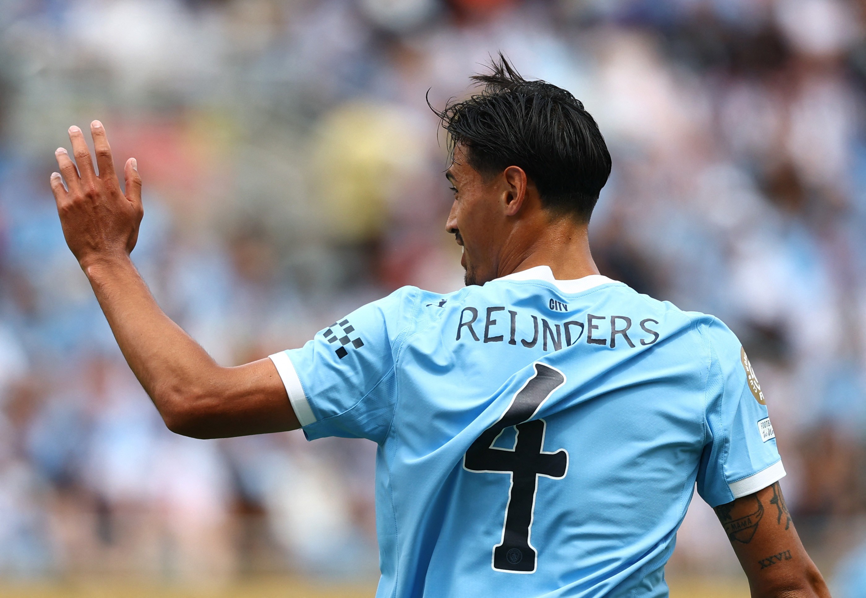 Tijjani Reijnders pictured playing for Manchester City