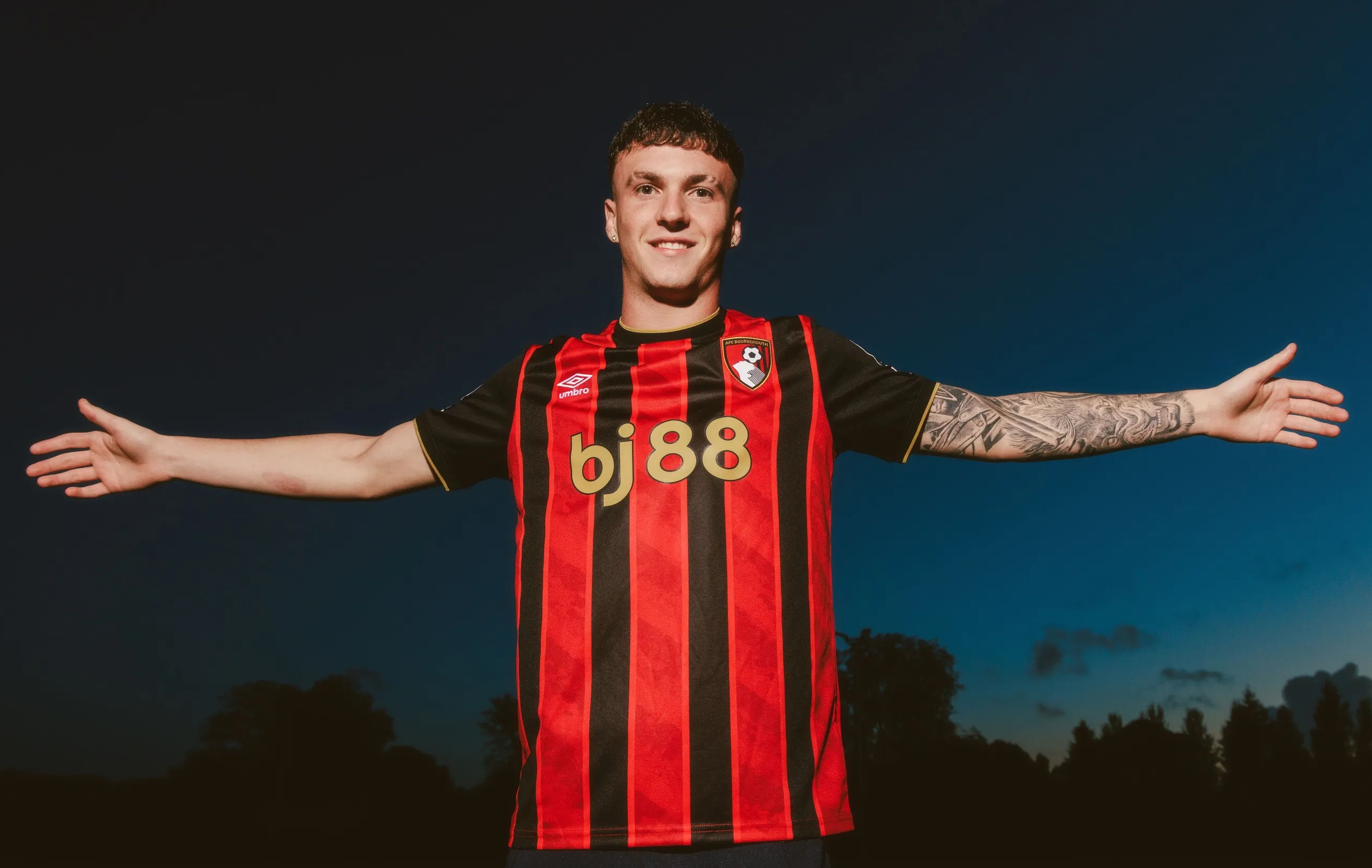 Alex Jimenez posing for a photo after signing for Bournemouth