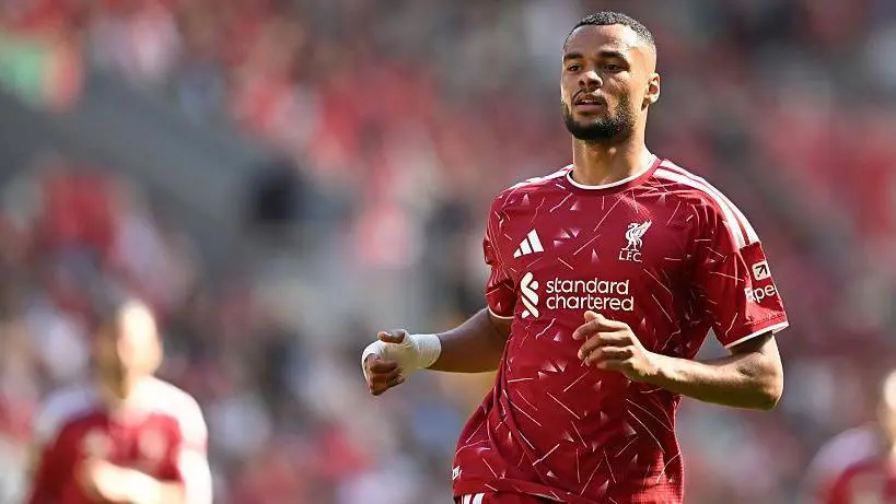 Cody Gakpo in Liverpool FC kit during a match at Anfield.