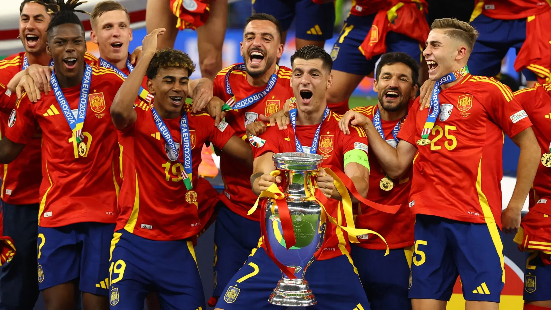 Celebration of Spain football team with the UEFA Euro 2024 trophy.
